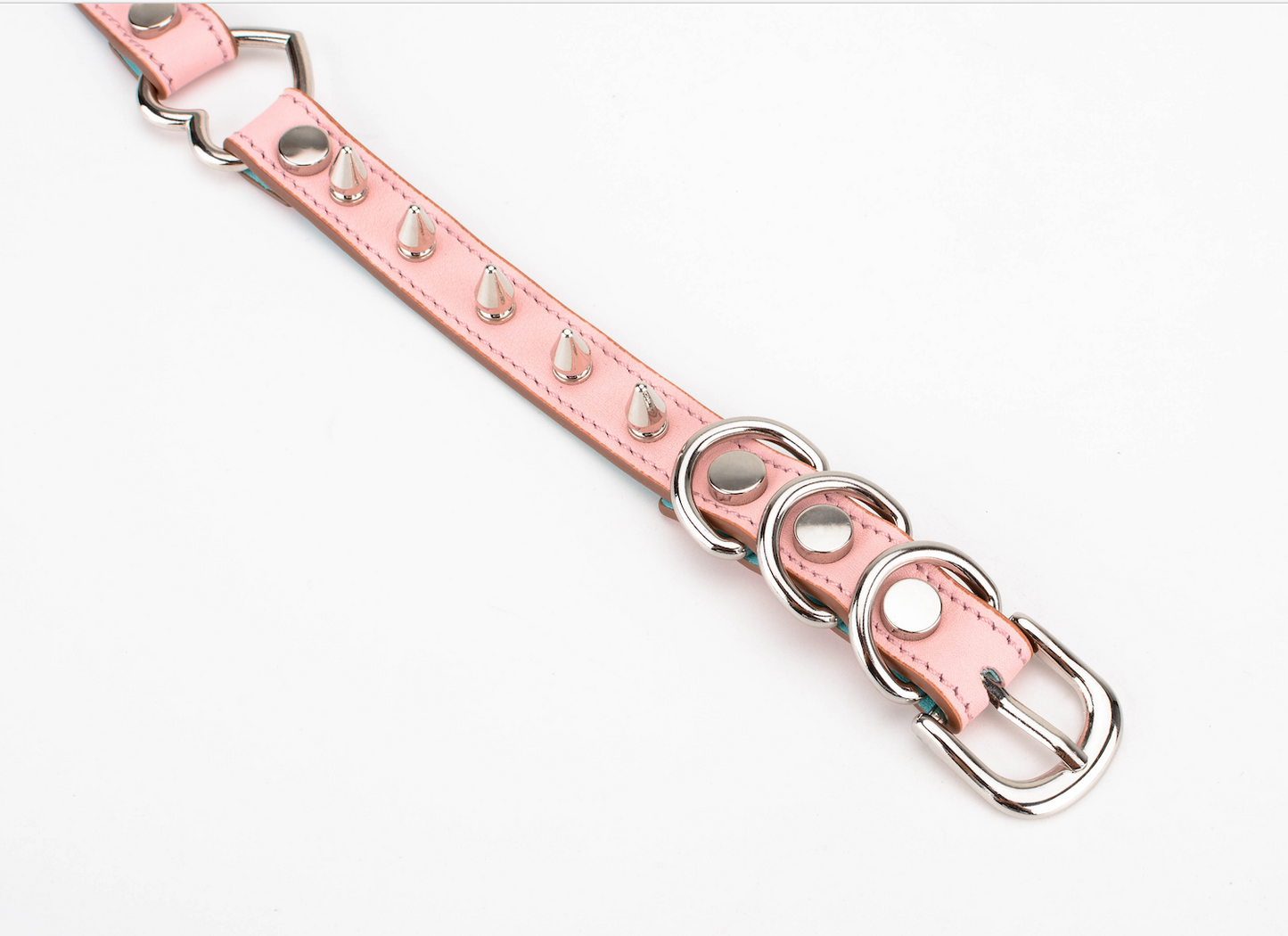 a pink spiked collar choker