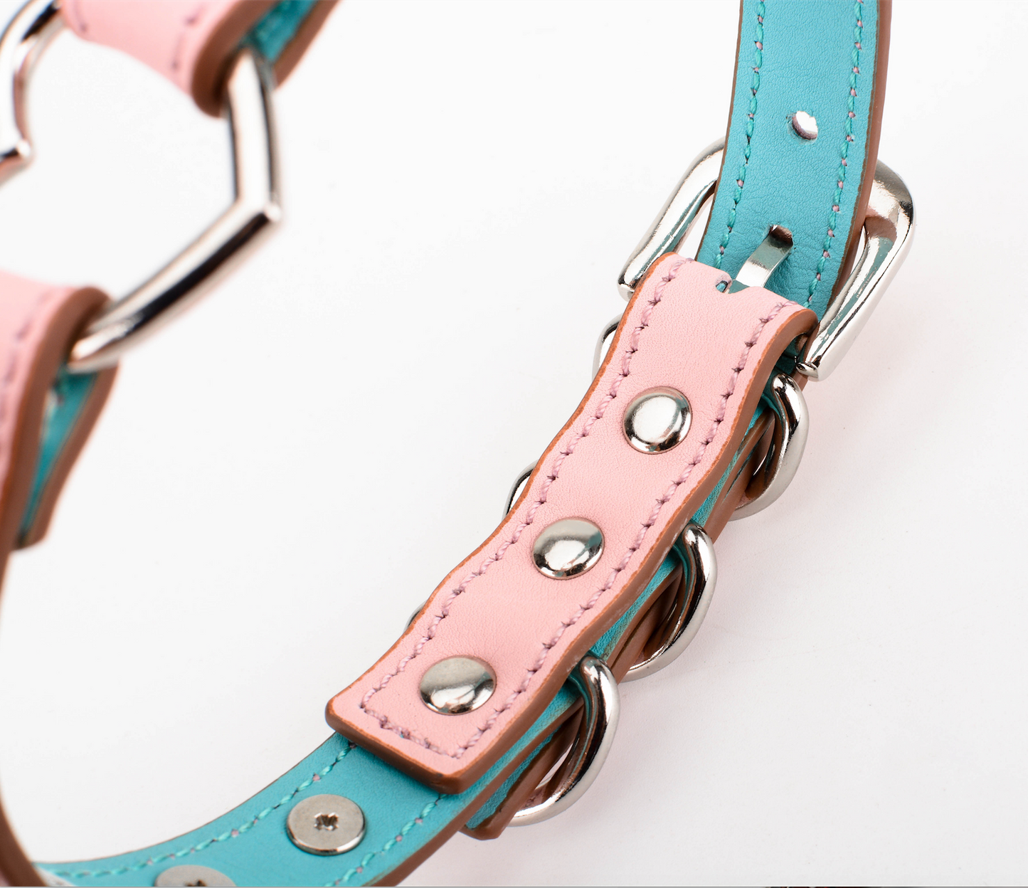 a pink spiked collar choker