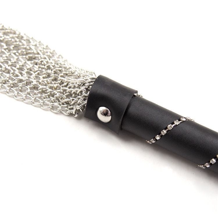 a Flogger Metal with Leather Handle