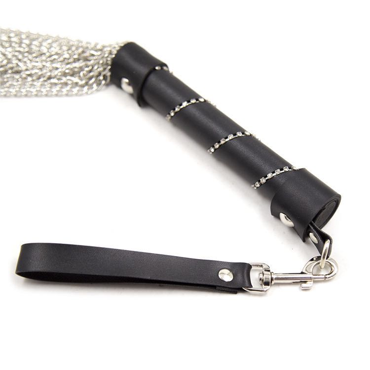 a Flogger Metal with Leather Handle