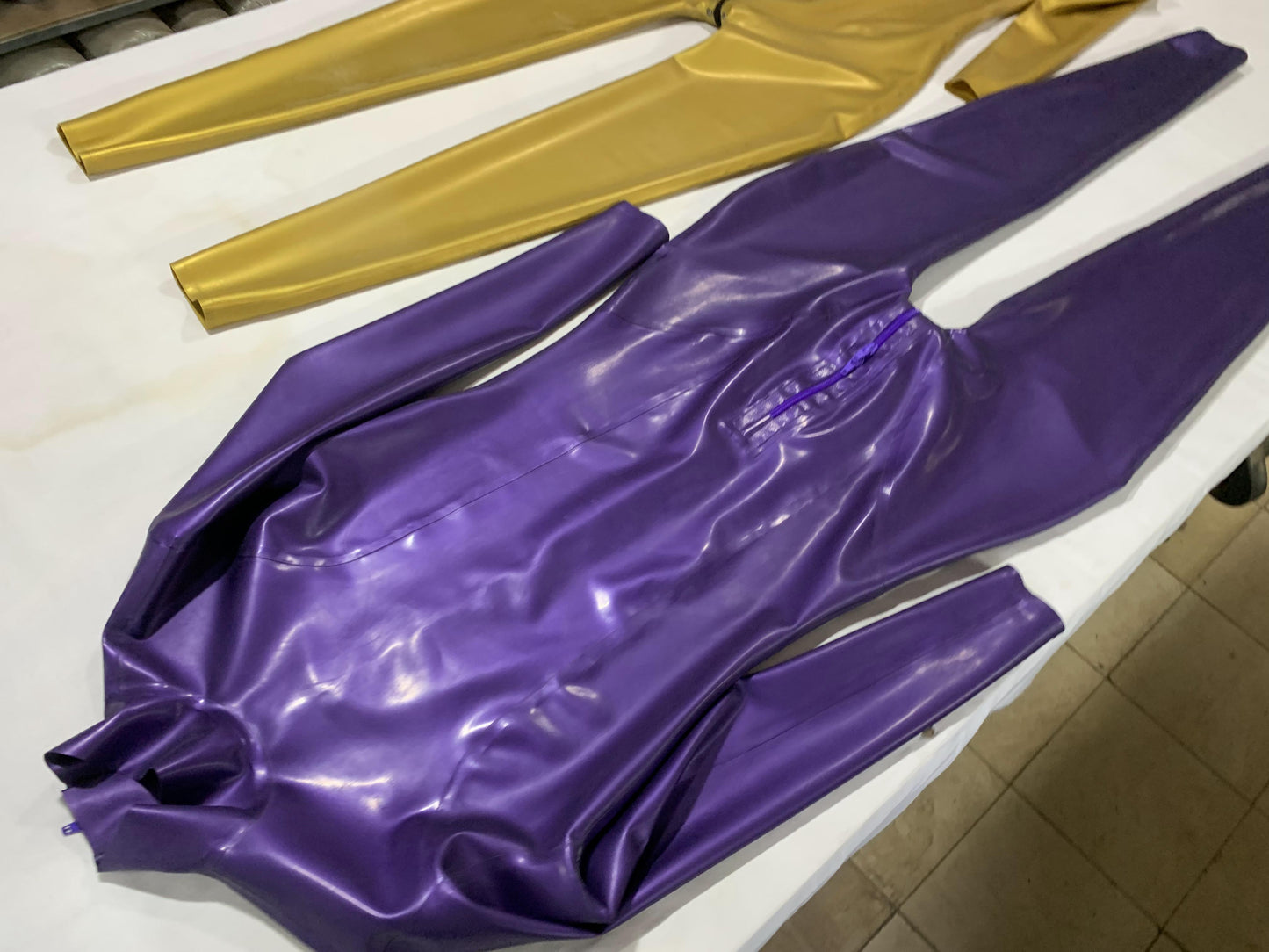 a latex bodysuit zipper crotch