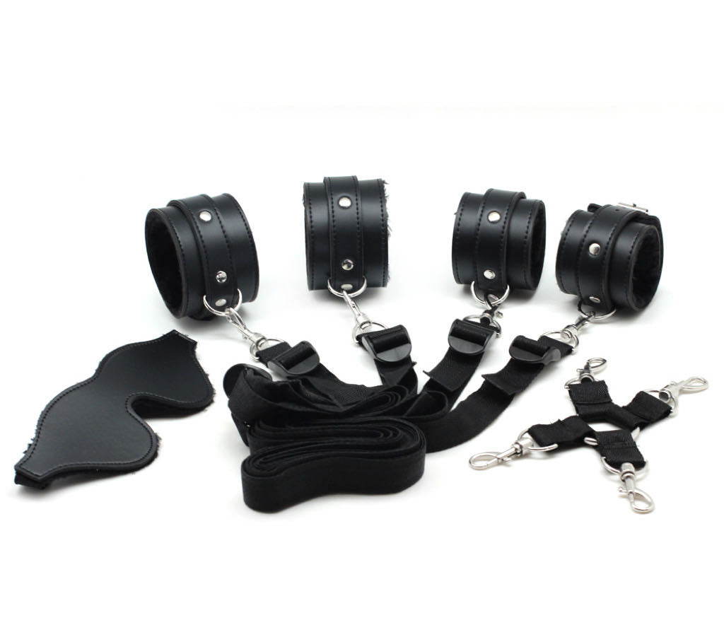 a black under bed restraint set