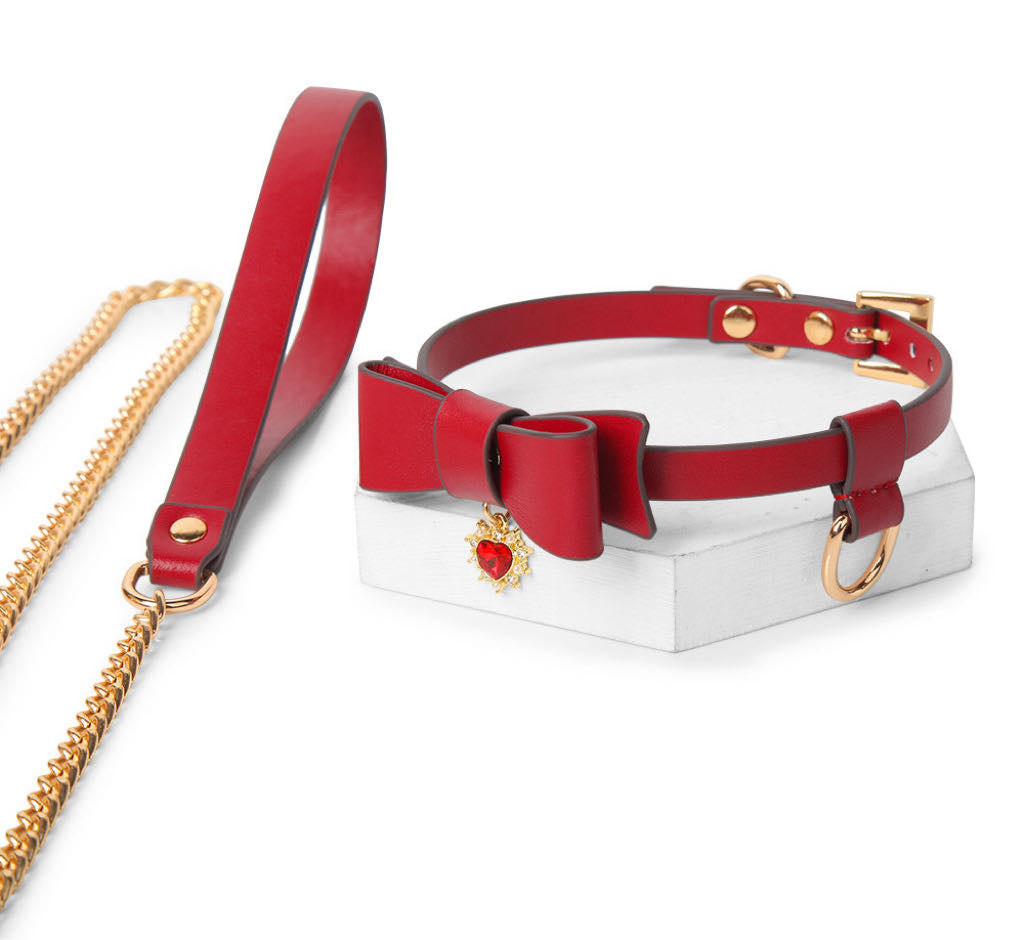 a red choker and chain for women