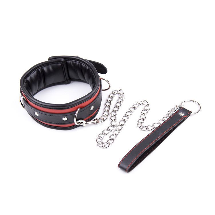 a black and red bdsm slave collar and leash set