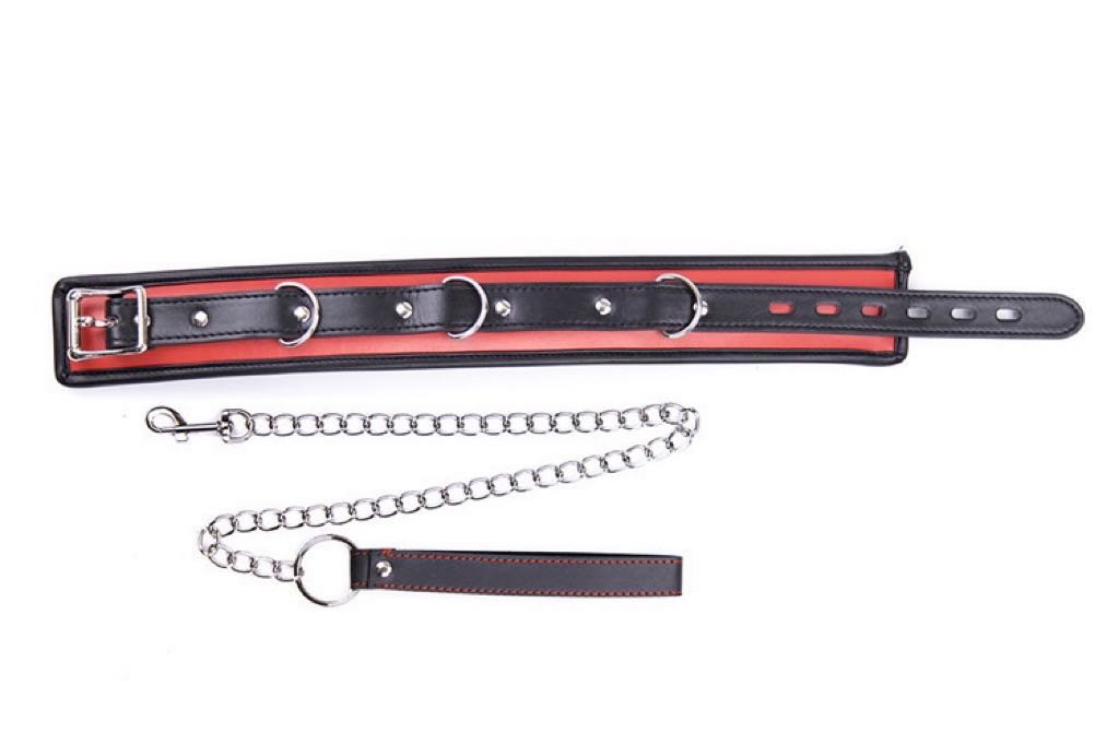 a black and red BDSM Collar and Leash