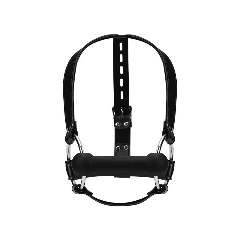Black padded harness-style restraint with adjustable straps, metal rings, and a central buckle closure
