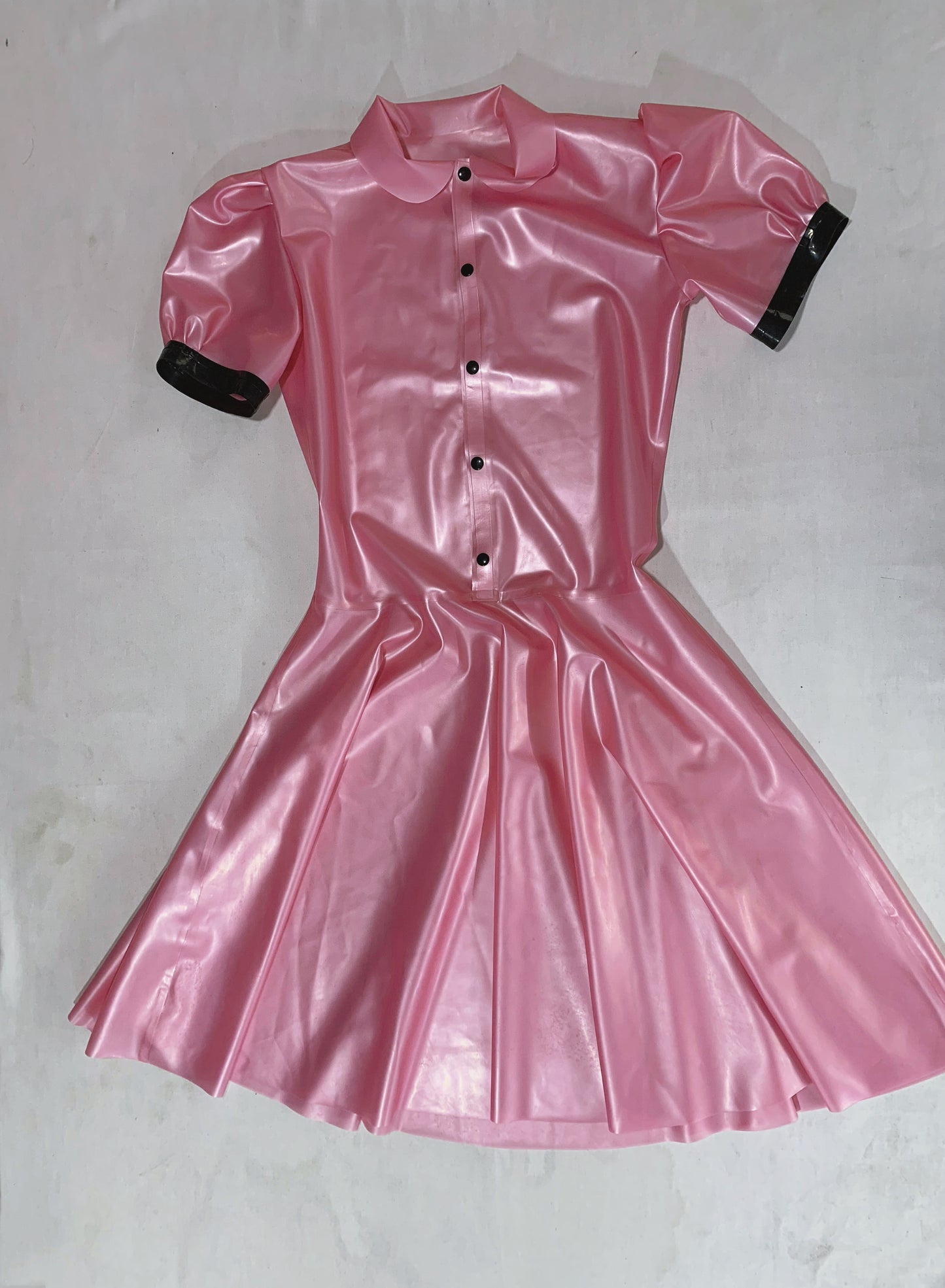 a pink latex dress