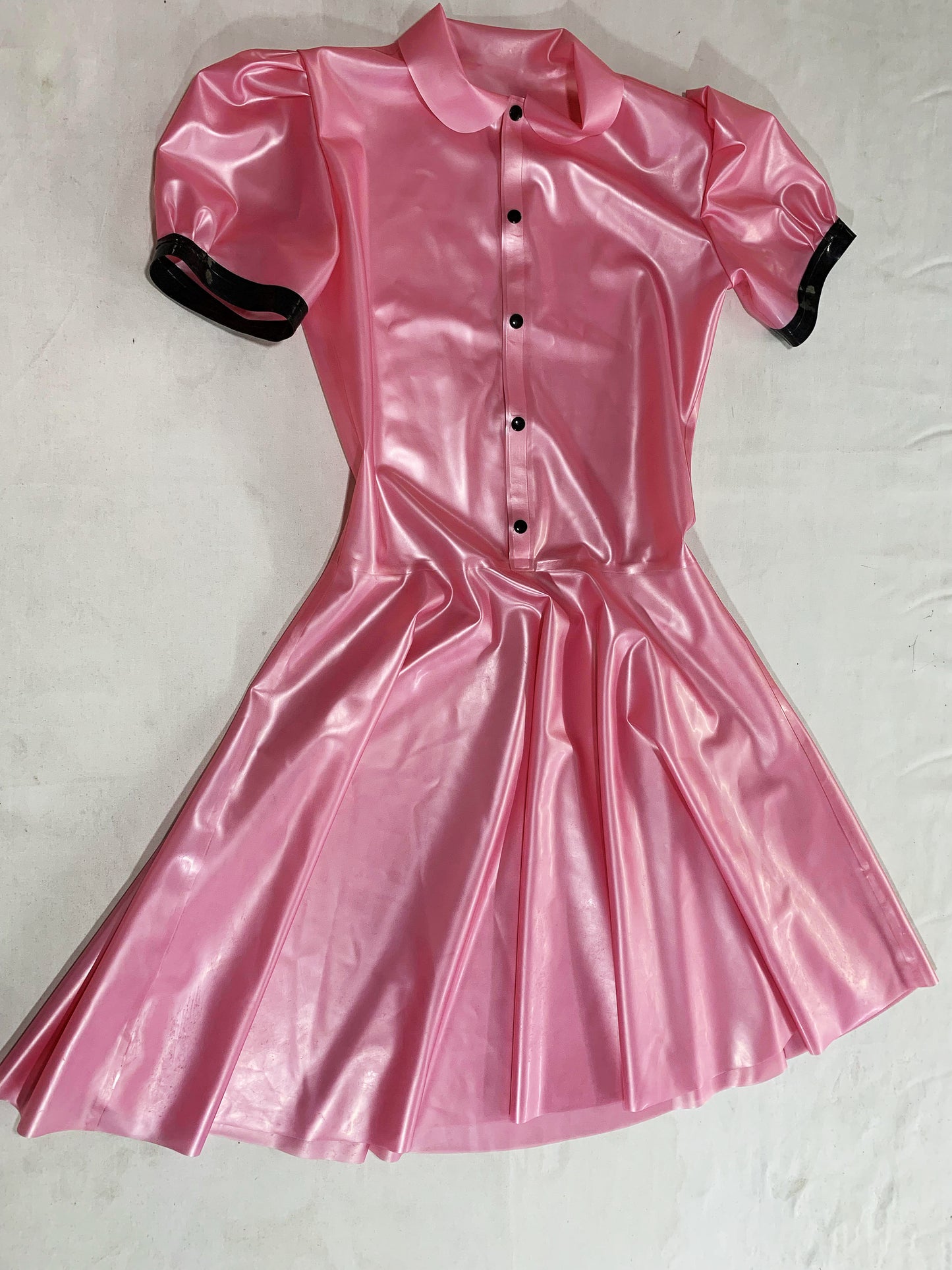 a pink latex dress