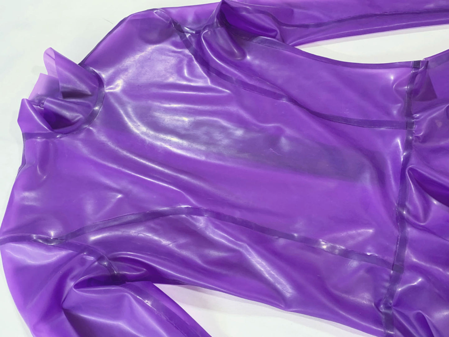 a purple long sleeve latex dress