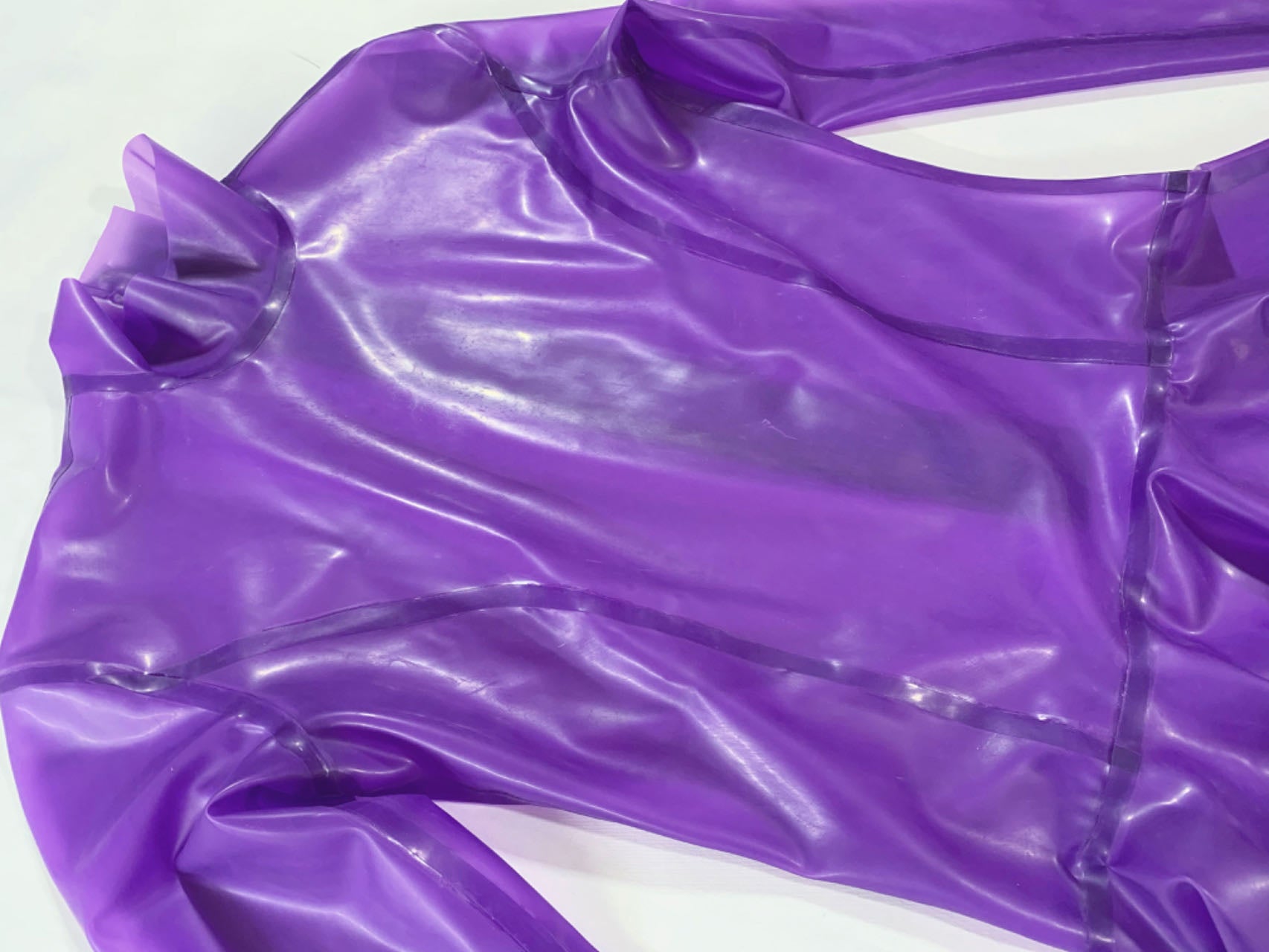 a purple long sleeve latex dress