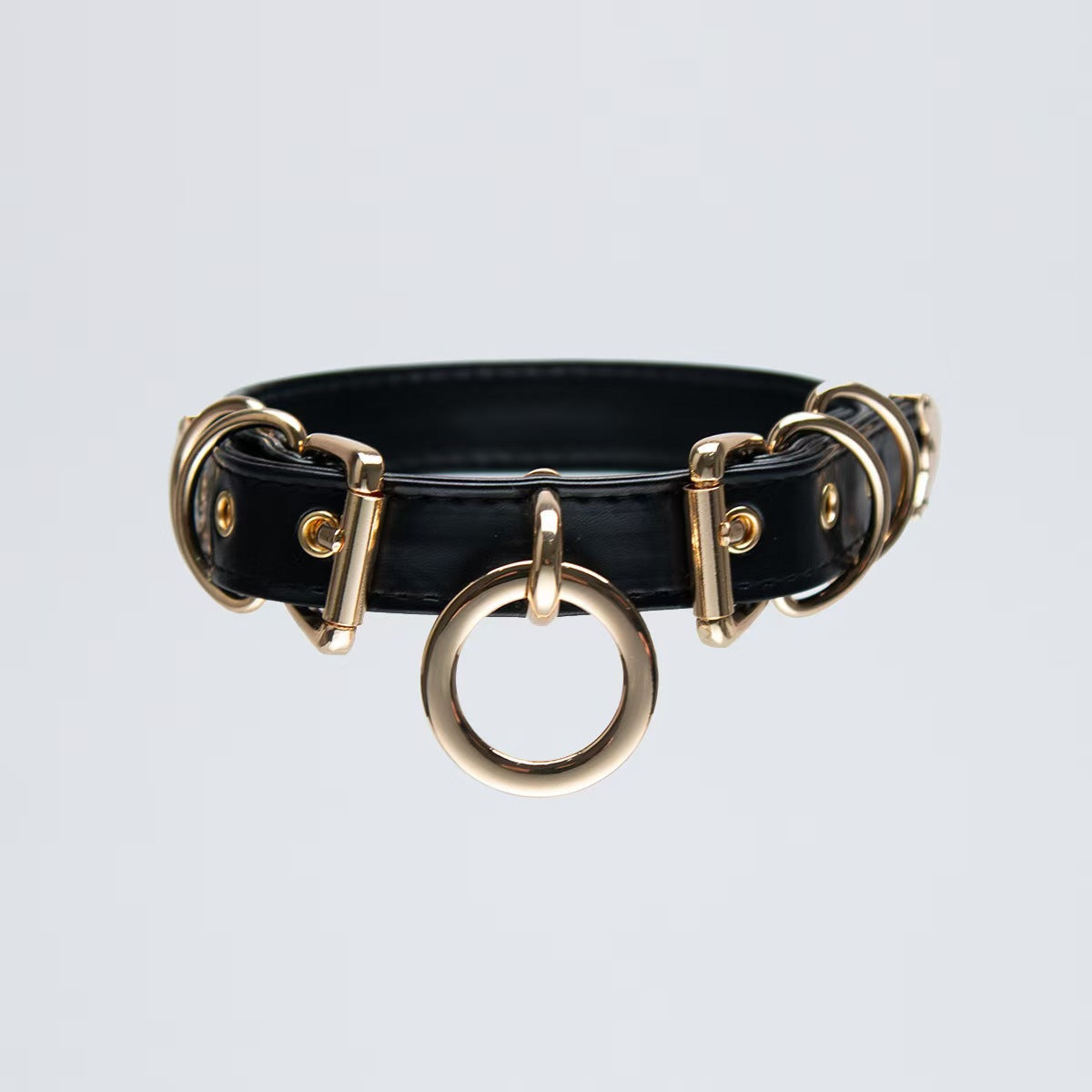 black faux leather o ring collar choker with polished gold alloy buckles on model neck front view