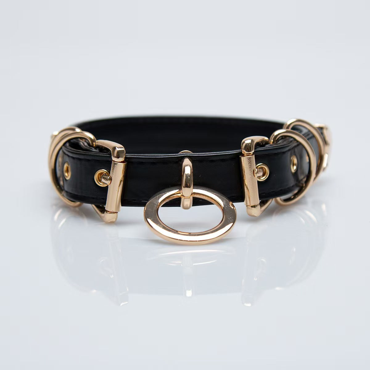 black faux leather o ring collar choker with polished gold alloy buckles on model neck front view
