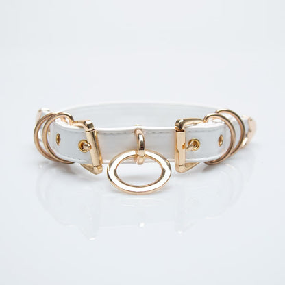 white faux leather o ring collar choker with polished gold alloy buckles on model neck front view