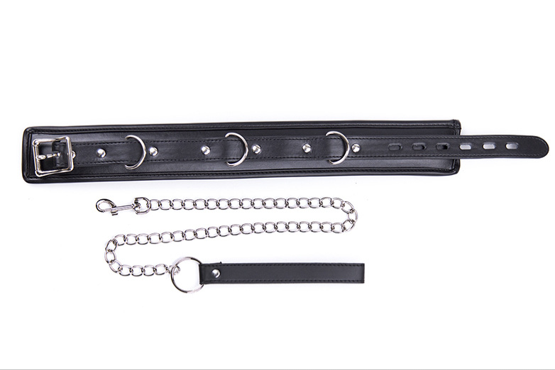 a black bdsm collar and leash set