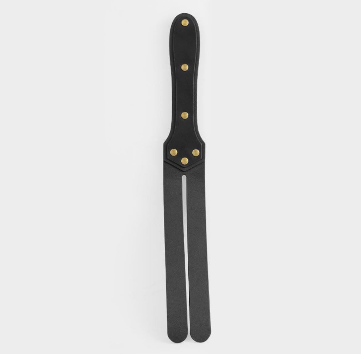 a black Sex Whip Paddle slapper paddle