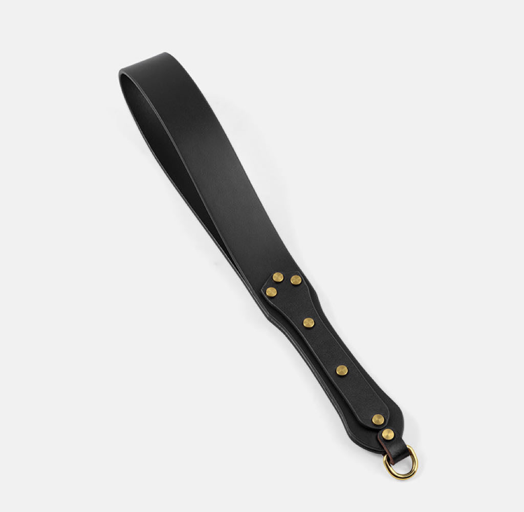 a black spanking paddle