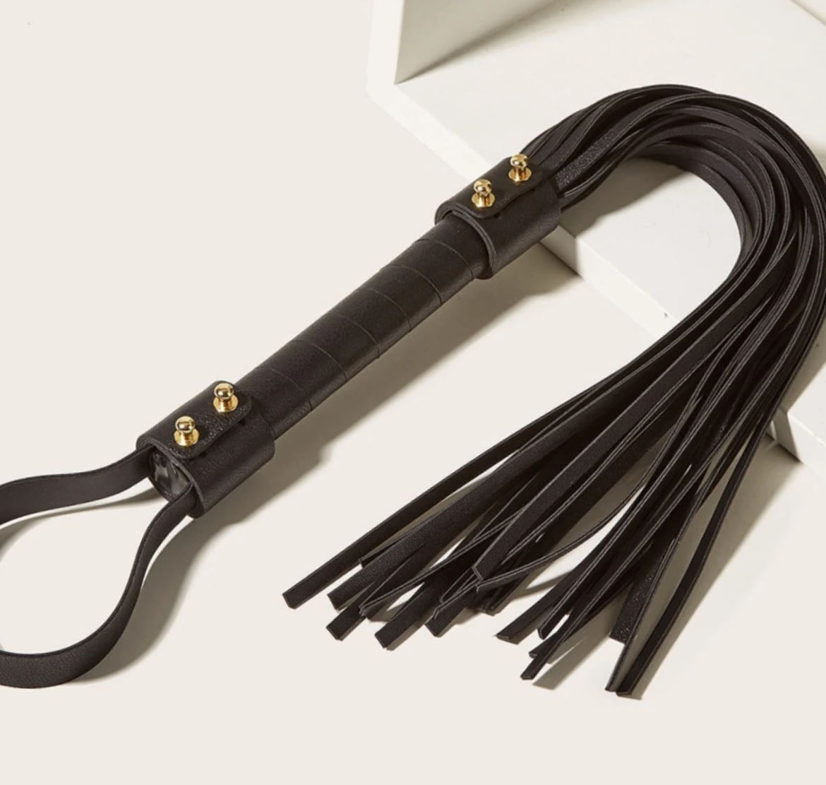 a black Leather Flogger BDSM Whips