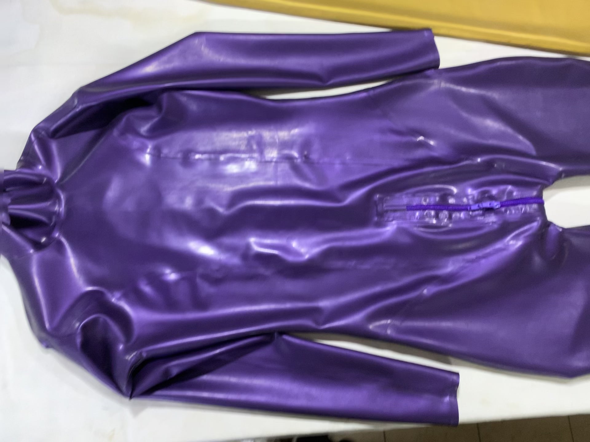 a latex bodysuit zipper crotch