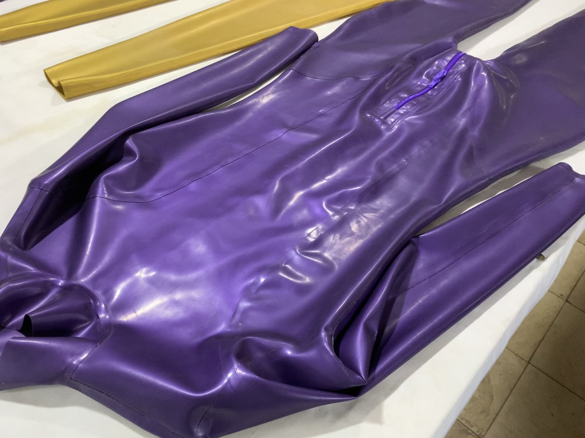 a latex bodysuit zipper crotch