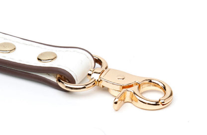 white leather bondage handcuffs