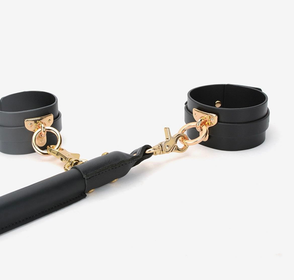 a bondage spreader bar and cuffs set