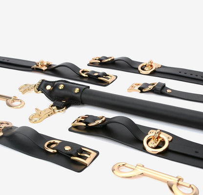 a bondage spreader bar and cuffs set