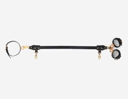 a bondage spreader bar and cuffs set