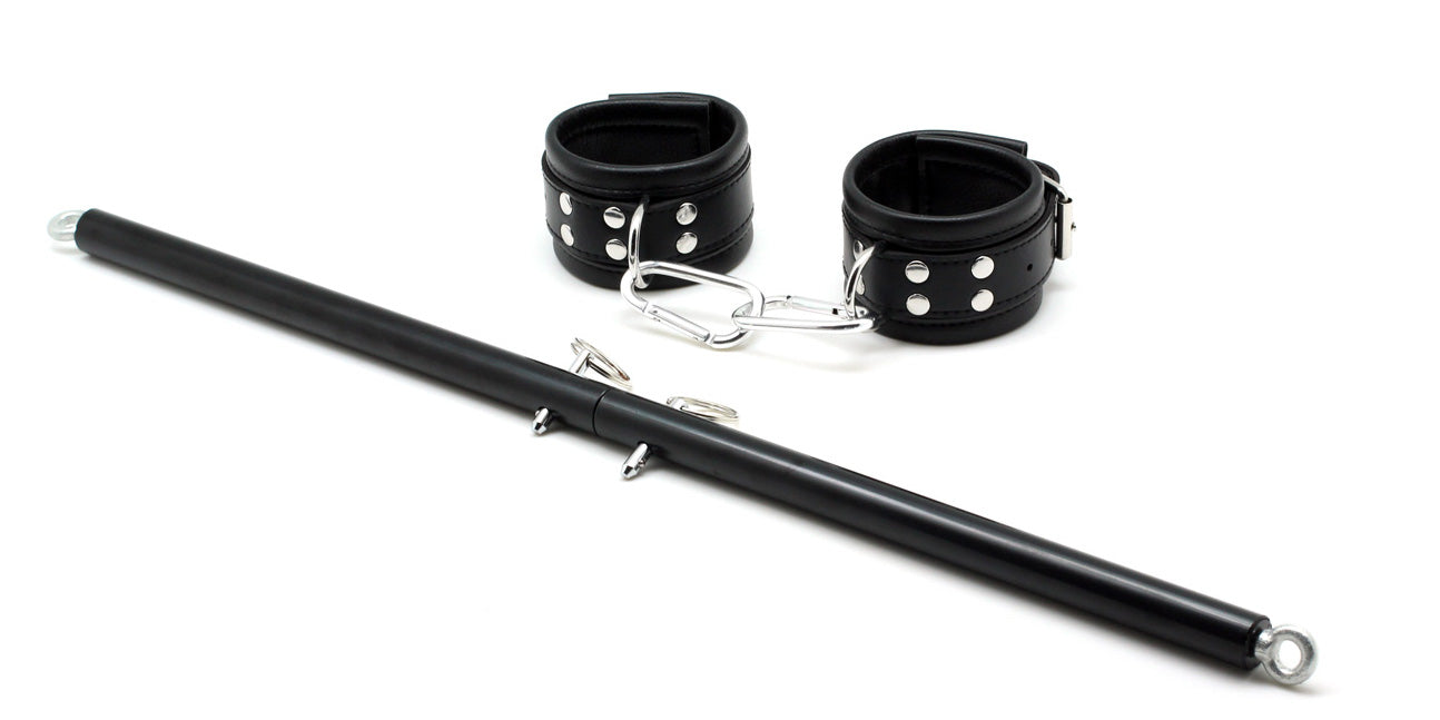 a black Sex Leg Spreader Bar and cuffs