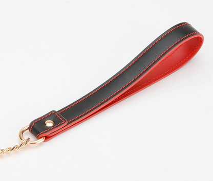 a black and red bdsm leash