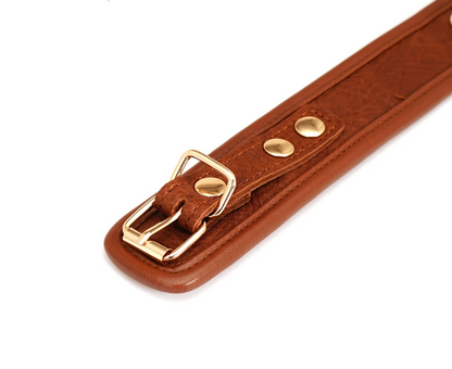 a brown bondage collar slave collar