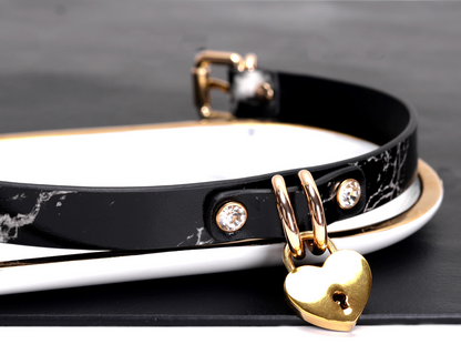 a black leather heart lock collar