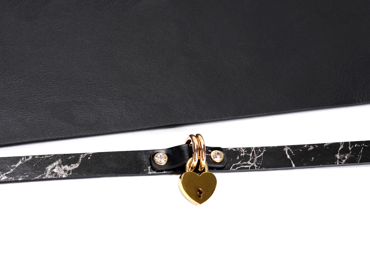 a black leather heart lock collar