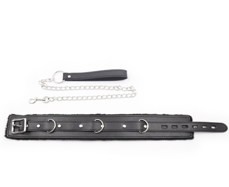 a black bdsm collar and leash set