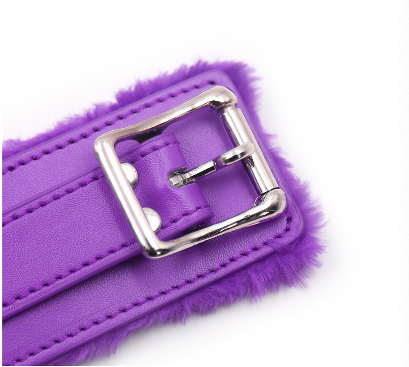 a purple leather bondage collar and leash set