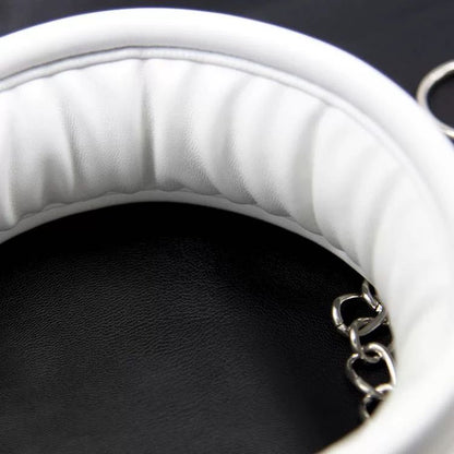 a white Bondage Collar and Leash