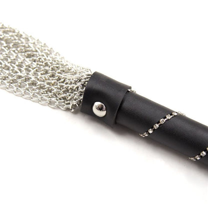 a Flogger Metal with Leather Handle 