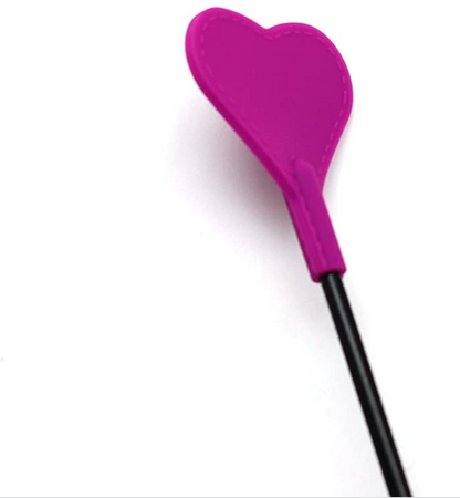 a pink Heart Riding Crop riding crop sex toy