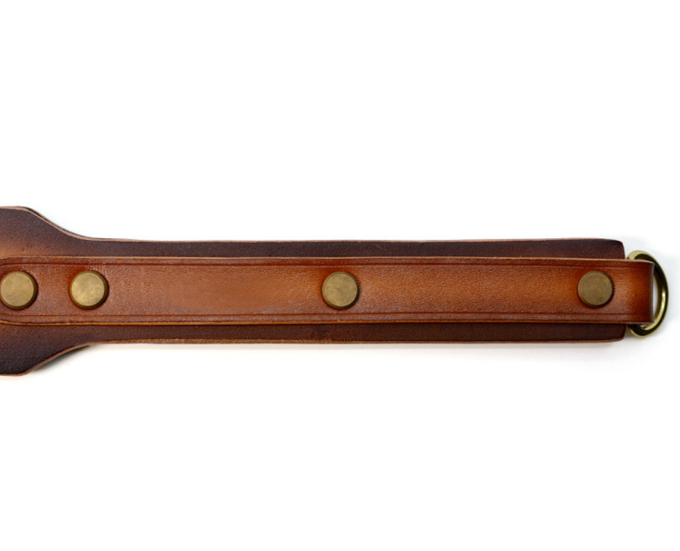 a Spanking Paddle with Holes