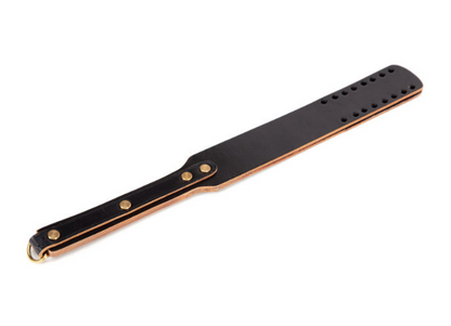 a Spanking Paddle with Holes