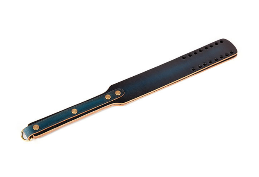 a Spanking Paddle with Holes
