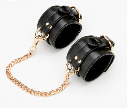 a pair of bondage handcuffs