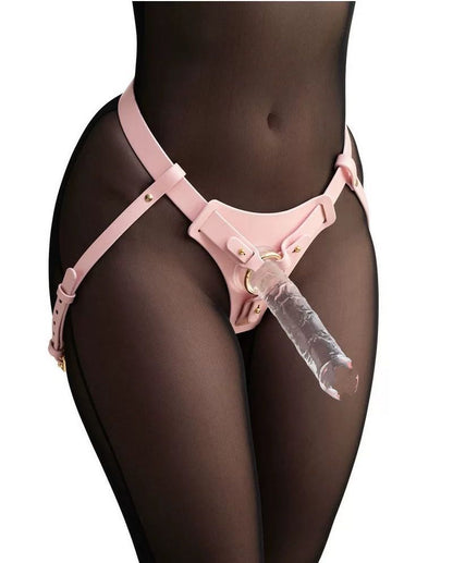 a pink leather strap on harness